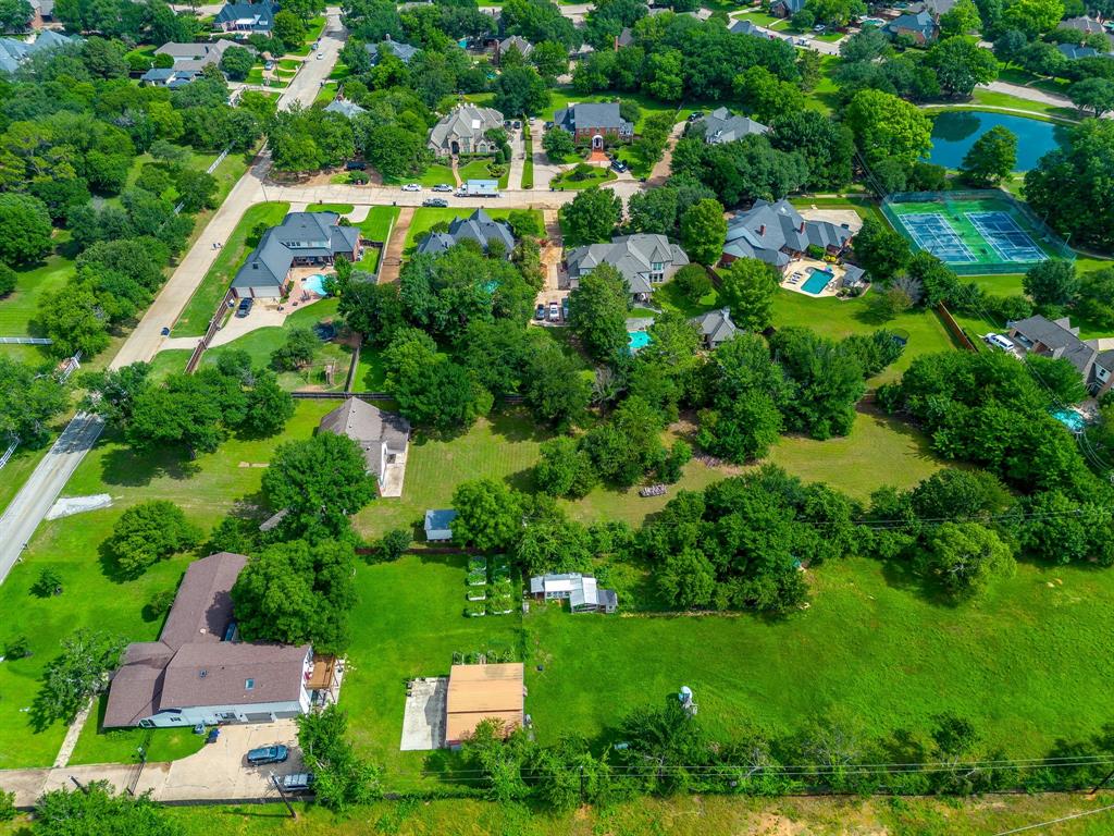 7404 John McCain Road Colleyville, TX 76034 - Photo 11 of 21 an aerial view of a houses with yard