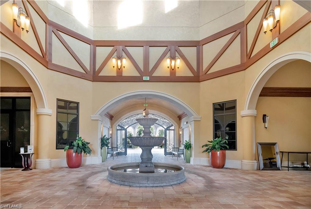 9590 Trevi Court, Unit 5337 Naples, FL 34113 - Photo 31 of 35 a view of hall way with furniture