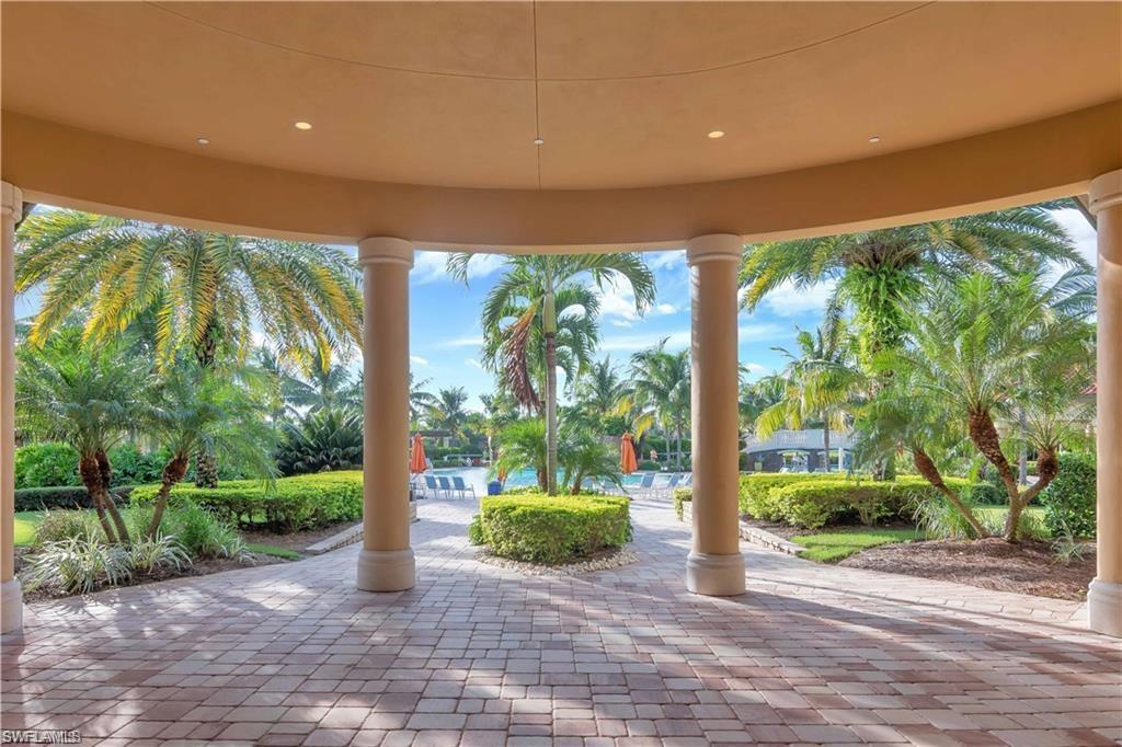9590 Trevi Court, Unit 5337 Naples, FL 34113 - Photo 32 of 35 a view of backyard with green space