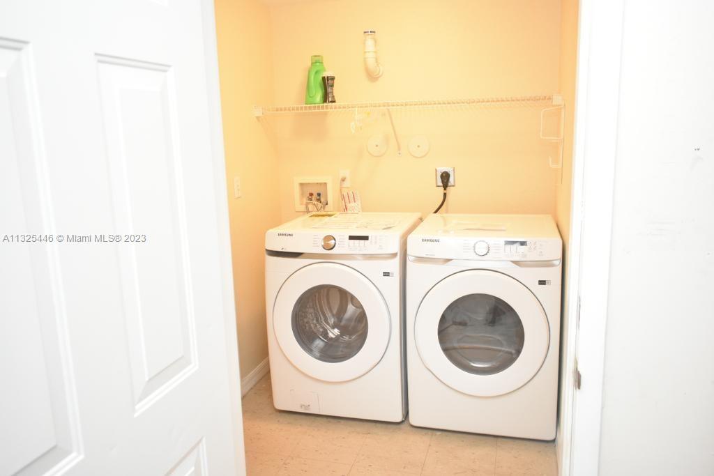 6520 West Sample Road, Unit 6520 Coral Springs, FL 33067 - Photo 15 of 33 a utility room with dryer and washer