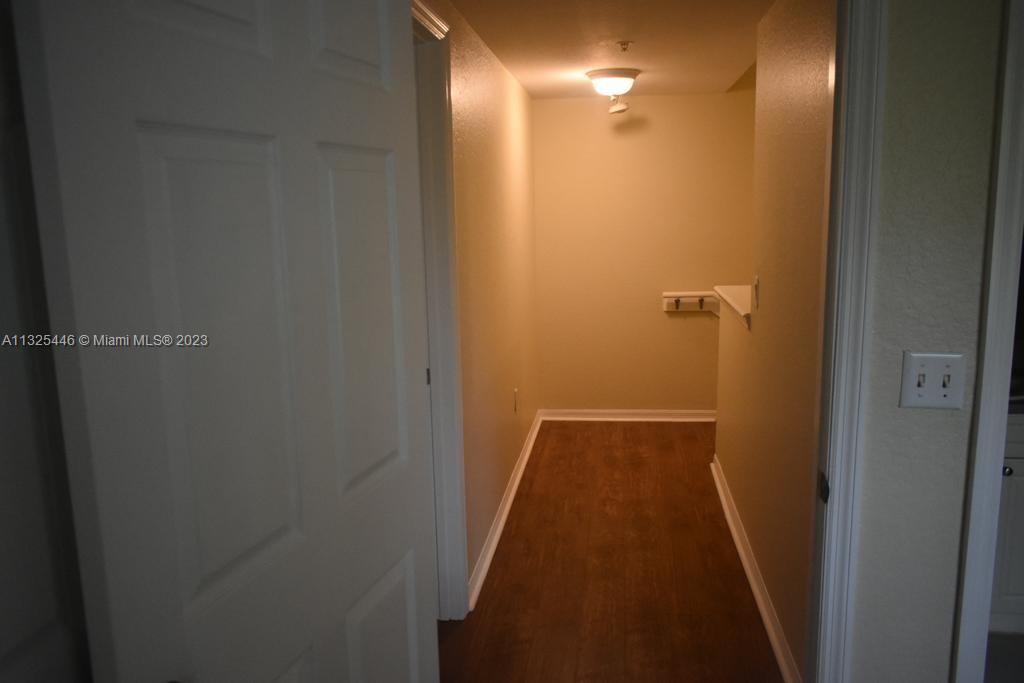 6520 West Sample Road, Unit 6520 Coral Springs, FL 33067 - Photo 19 of 33 a view of hallway with shower