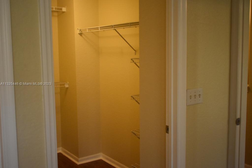 6520 West Sample Road, Unit 6520 Coral Springs, FL 33067 - Photo 22 of 33 a bathroom with a shower