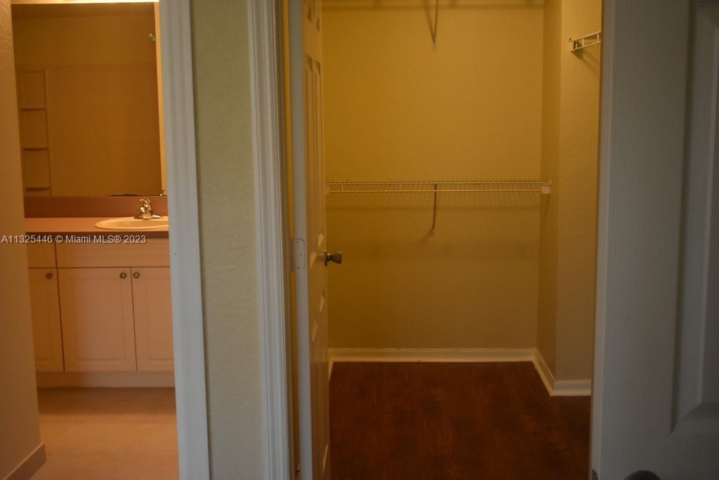 6520 West Sample Road, Unit 6520 Coral Springs, FL 33067 - Photo 23 of 33 a bathroom with a shower