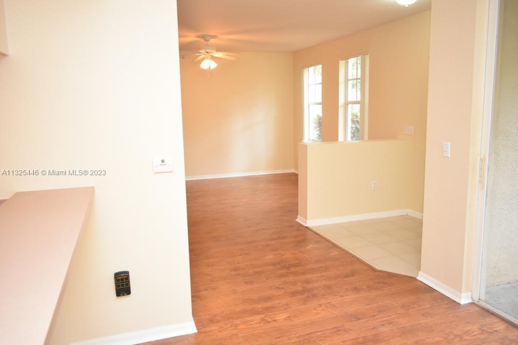 6520 West Sample Road, Unit 6520 Coral Springs, FL 33067 - Photo 8 of 33 a view of an empty room
