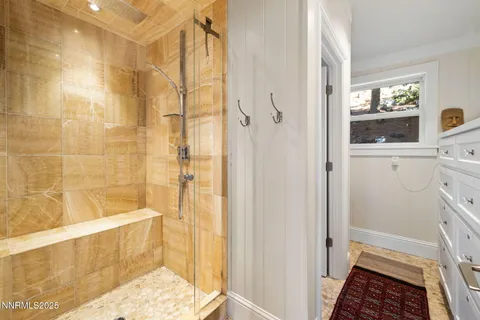 a bathroom with a sink and a shower