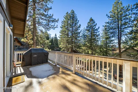 a view of balcony with furniture
