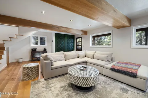 a living room with furniture or couch and a window