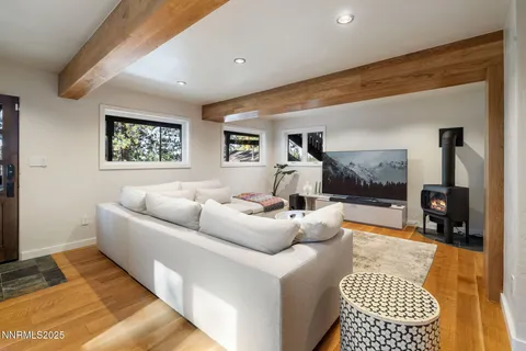 a living room with furniture and a rug