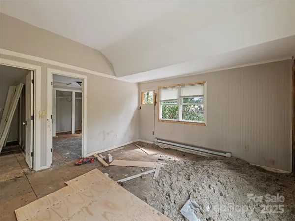 an empty room with windows
