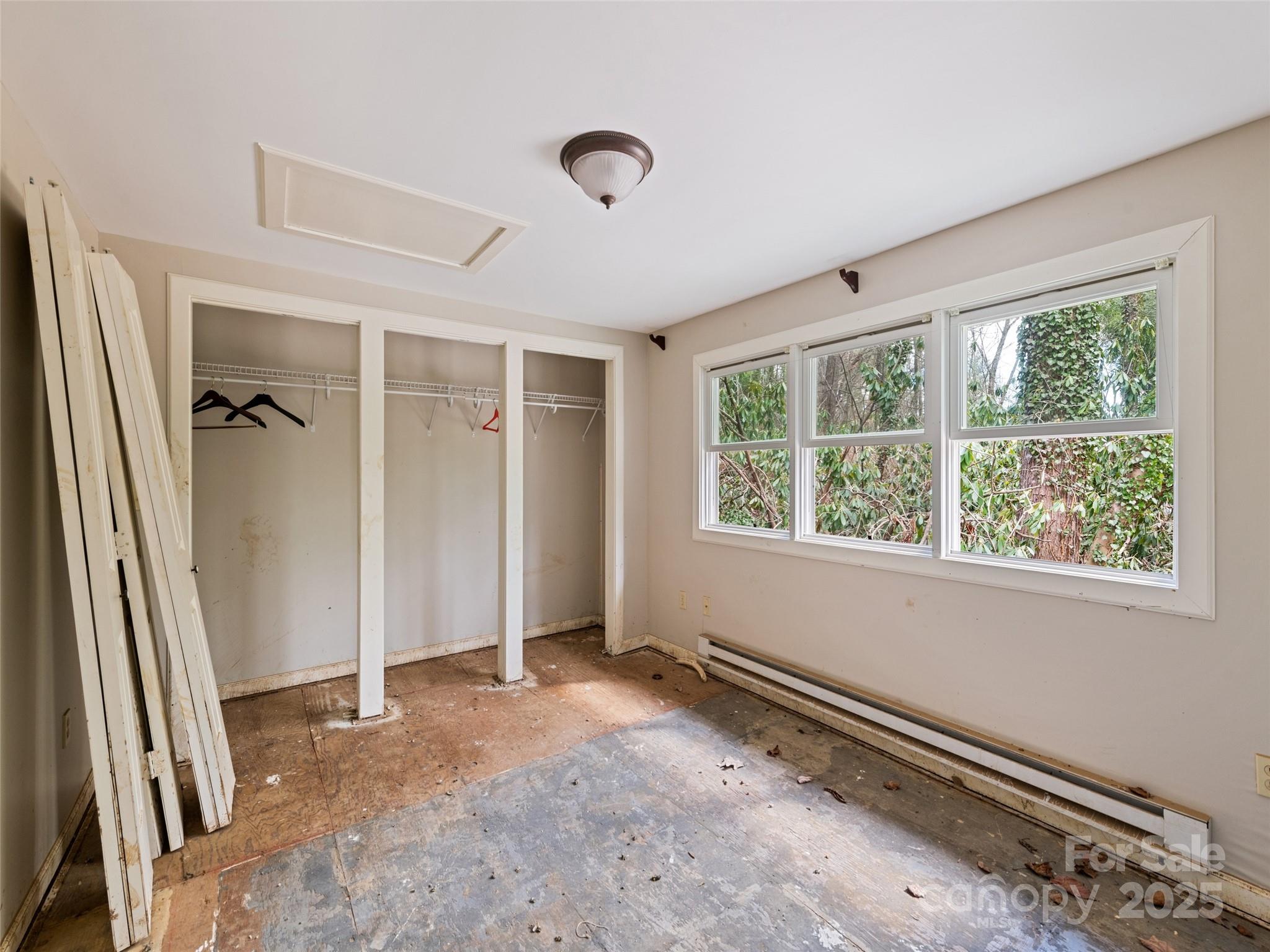 61 Riverbend Street Canton, NC 28716 - Photo 20 of 24 an empty room with windows