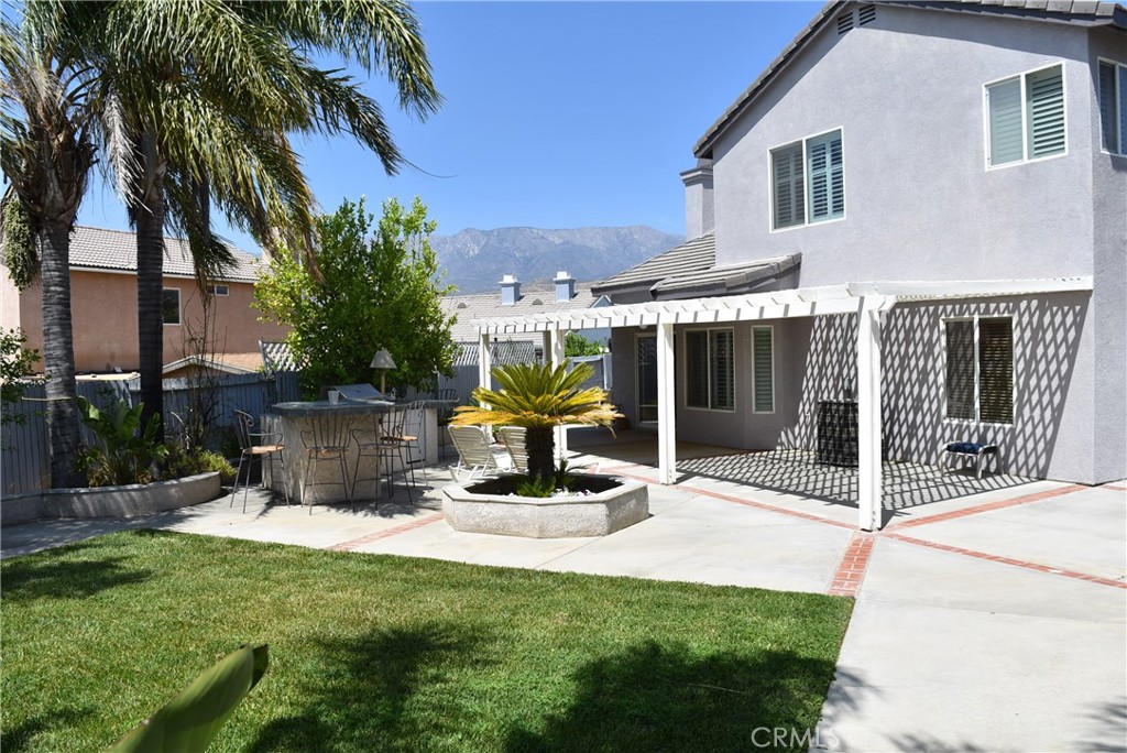 1665 Ravenswood Road Beaumont, CA 92223 - Photo 37 of 41 a view of a house with backyard and sitting area