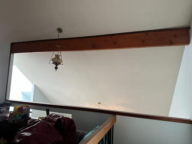 a bathroom with a sink double vanity mirror and a bathtub