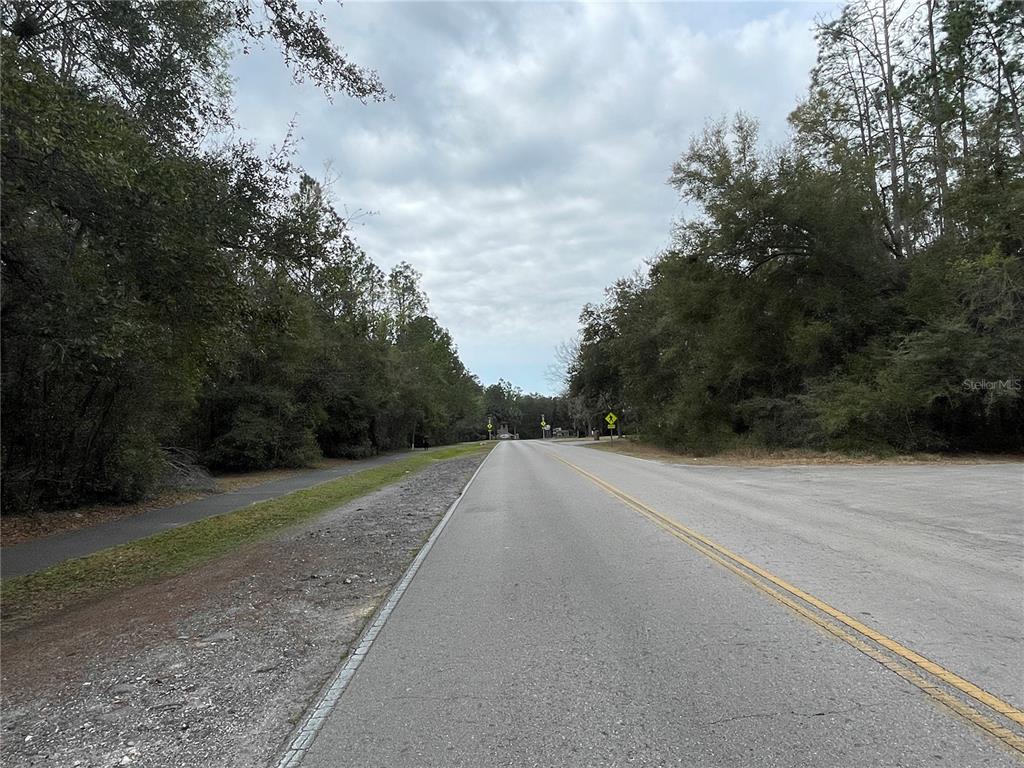 8717 Southwest Archer Road Gainesville, FL 32608 - Photo 21 of 26 a view of a backyard of a house