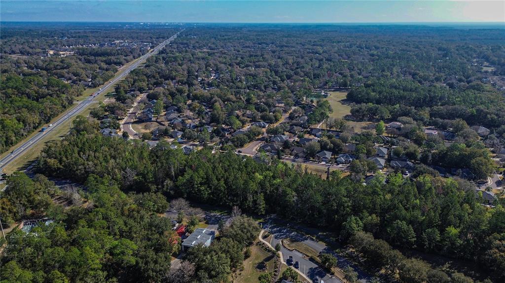 8717 Southwest Archer Road Gainesville, FL 32608 - Photo 4 of 26 an aerial view of residential house and outdoor space
