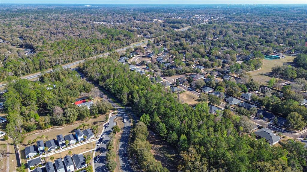 8717 Southwest Archer Road Gainesville, FL 32608 - Photo 9 of 26 an aerial view of multiple house