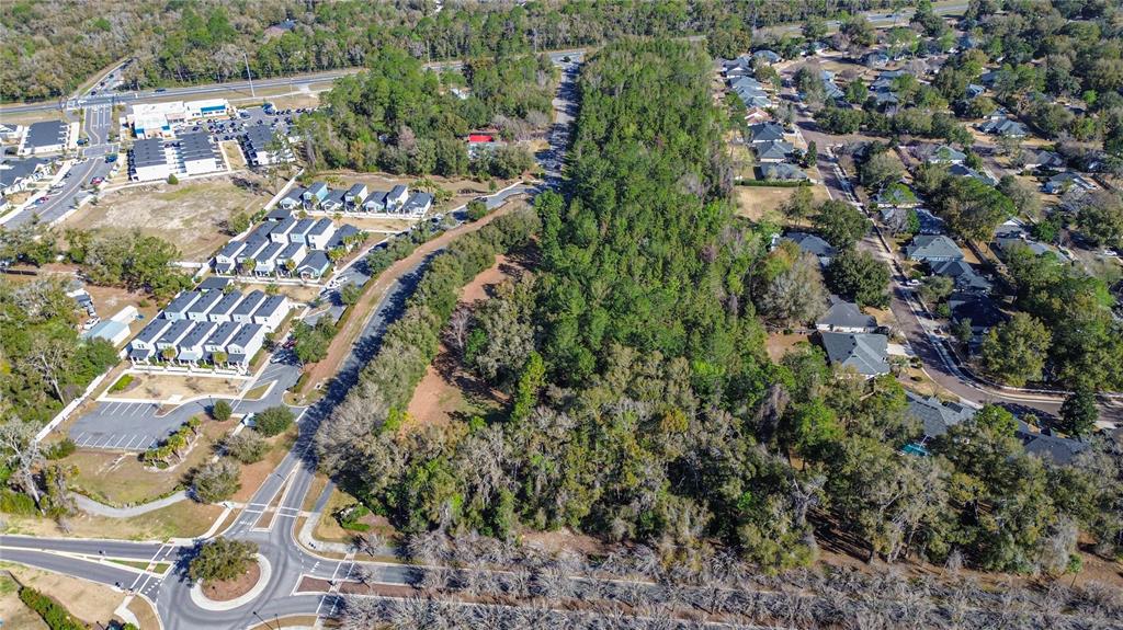 8717 Southwest Archer Road Gainesville, FL 32608 - Photo 10 of 26 an aerial view of residential houses with outdoor space