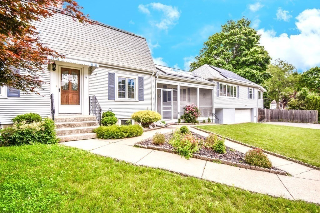 34 Farnum Road Waltham, MA 02453 - Photo 1 of 29 a front view of a house with garden and porch