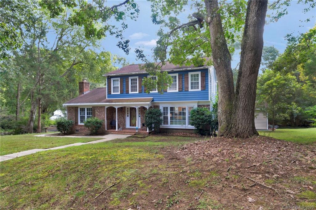 7101 Graburn Road Charlotte, NC 28226 - Photo 2 of 25 a view of a yard in front of a house