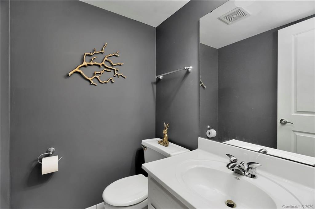 7101 Graburn Road Charlotte, NC 28226 - Photo 16 of 25 a bathroom with a sink mirror and toilet
