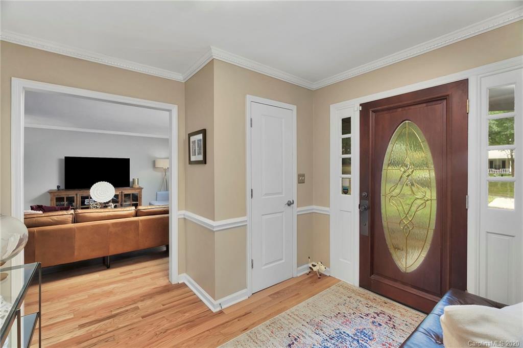7101 Graburn Road Charlotte, NC 28226 - Photo 4 of 25 a living room with furniture and a window