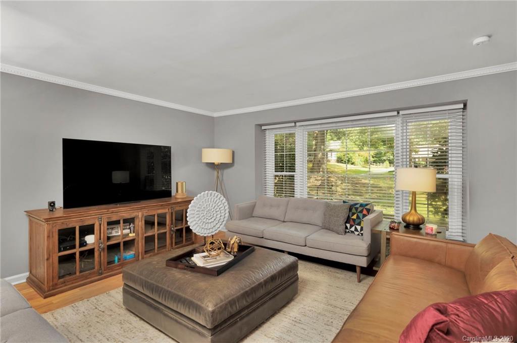 7101 Graburn Road Charlotte, NC 28226 - Photo 10 of 25 a living room with furniture and a flat screen tv