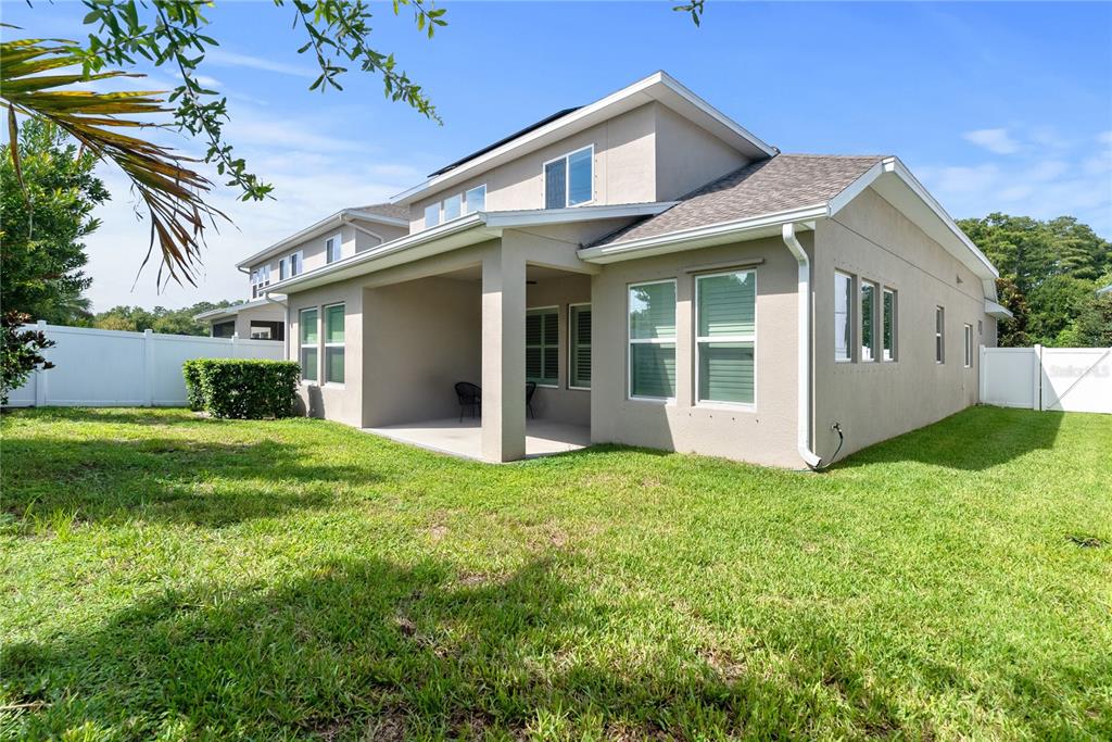 16409 Lucia Gardens Lane Tampa, FL 33625 - Photo 33 of 48 a view of a house with a yard
