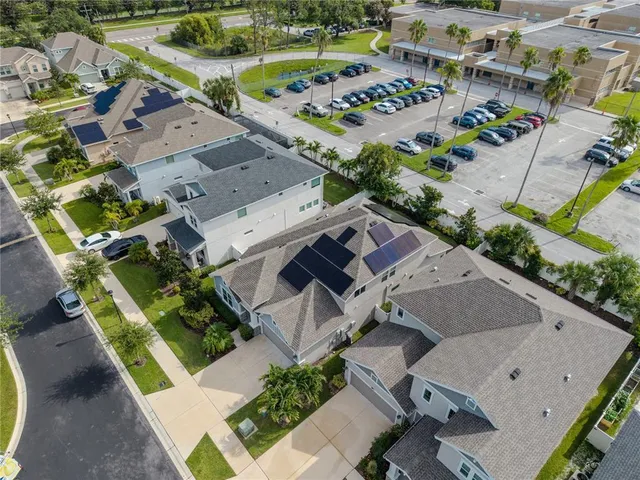 an aerial view of a house with a garden