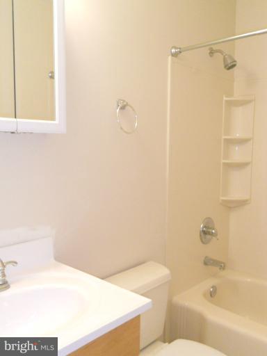 3034 Choctaw Ridge Court Woodbridge, VA 22192 - Photo 1 of 18 a bathroom with a shower and a toilet