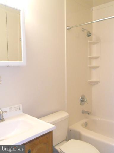 3034 Choctaw Ridge Court Woodbridge, VA 22192 - Photo 11 of 18 a bathroom with a sink a toilet and shower