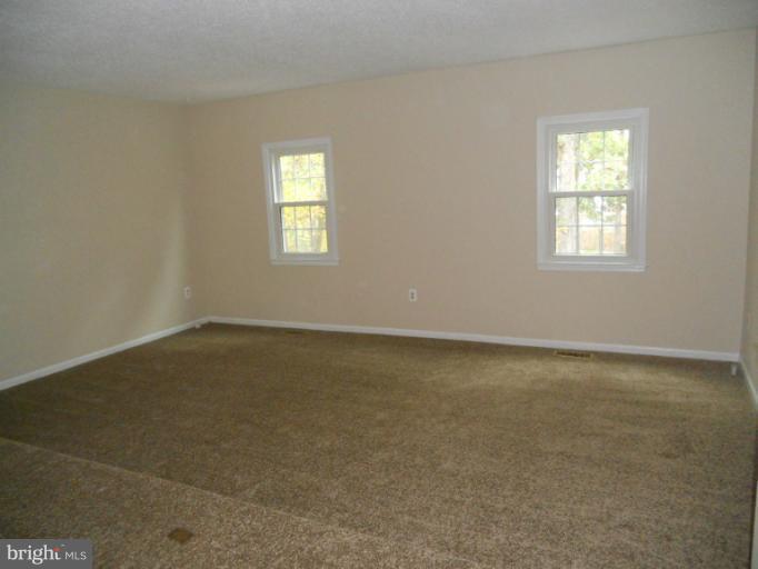 3034 Choctaw Ridge Court Woodbridge, VA 22192 - Photo 13 of 18 an empty room with a window