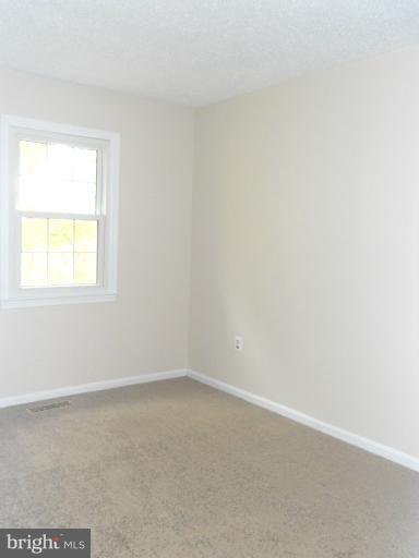 3034 Choctaw Ridge Court Woodbridge, VA 22192 - Photo 16 of 18 an empty room with a window