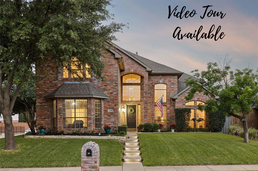 129 Timberbluff Lane Murphy, TX 75094 - Photo 2 of 34 a front view of a house with a garden