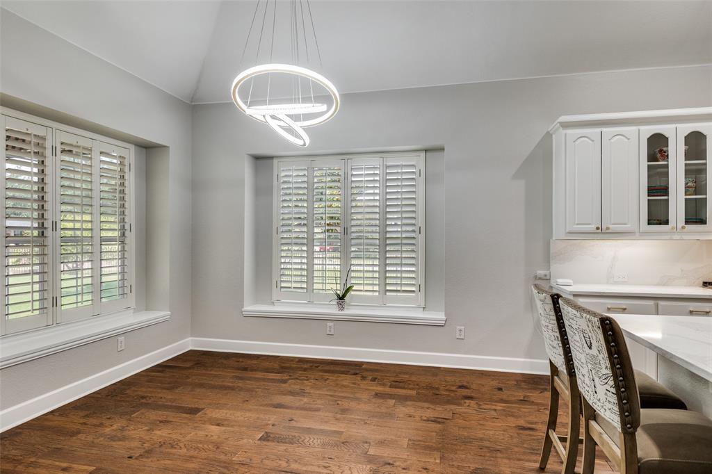 5809 Rathbone Drive Parker, TX 75002 - Photo 11 of 36 a view of an empty room with a window and wooden floor