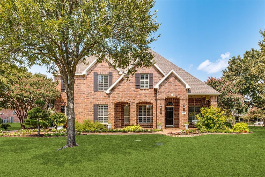 5809 Rathbone Drive Parker, TX 75002 - Photo 2 of 36 a view of a white house with a yard and large trees