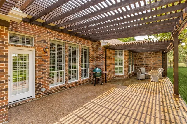 a view of a porch with wooden floor