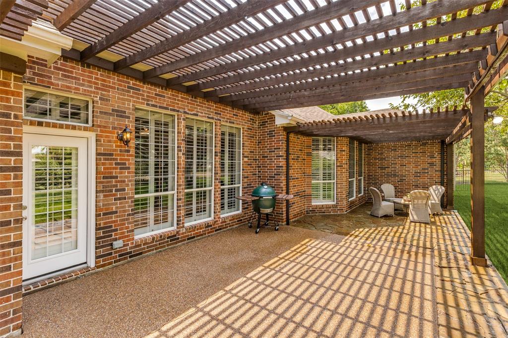 5809 Rathbone Drive Parker, TX 75002 - Photo 27 of 36 a view of a porch with wooden floor