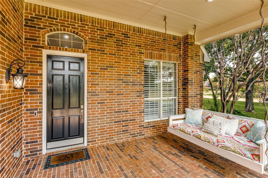 5809 Rathbone Drive Parker, TX 75002 - Photo 3 of 36 a view of a brick wall with a window