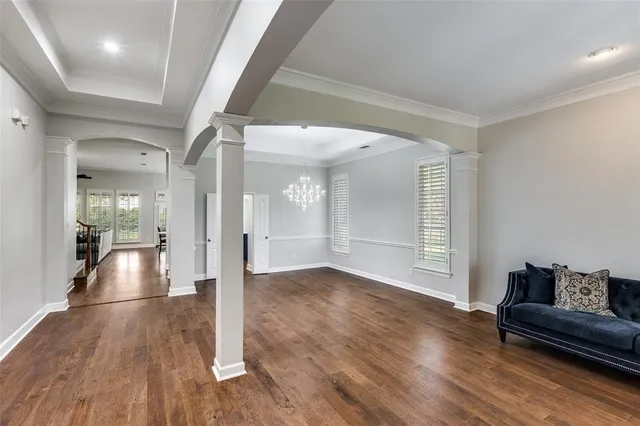 a view of a livingroom with furniture and wooden floor