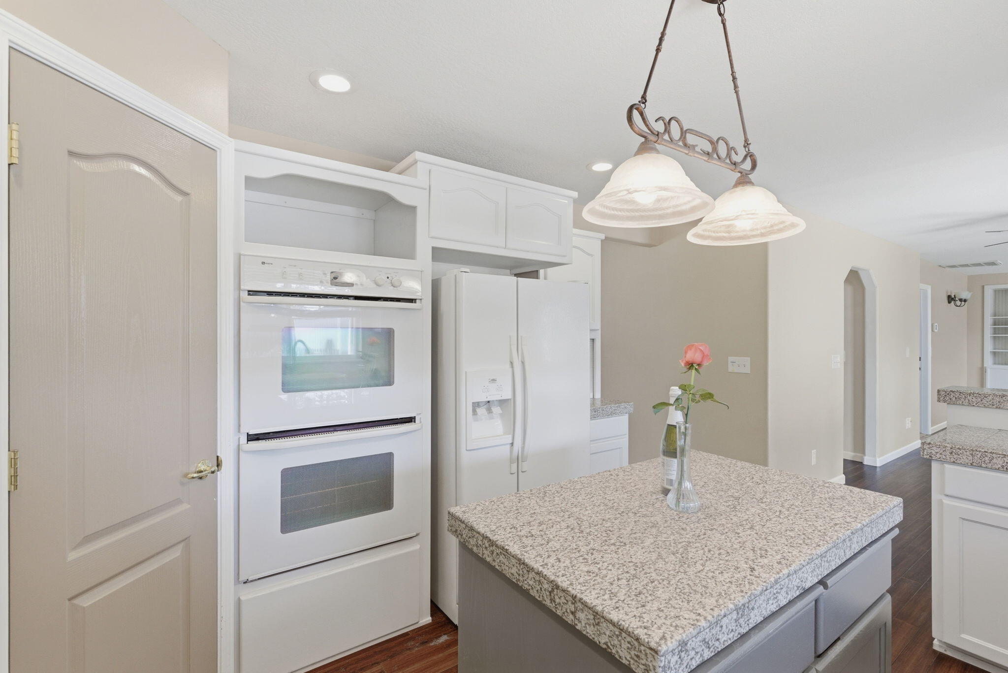 196 Nadine Lane Central Point, OR 97502 - Photo 15 of 54 a kitchen with a table and chandelier