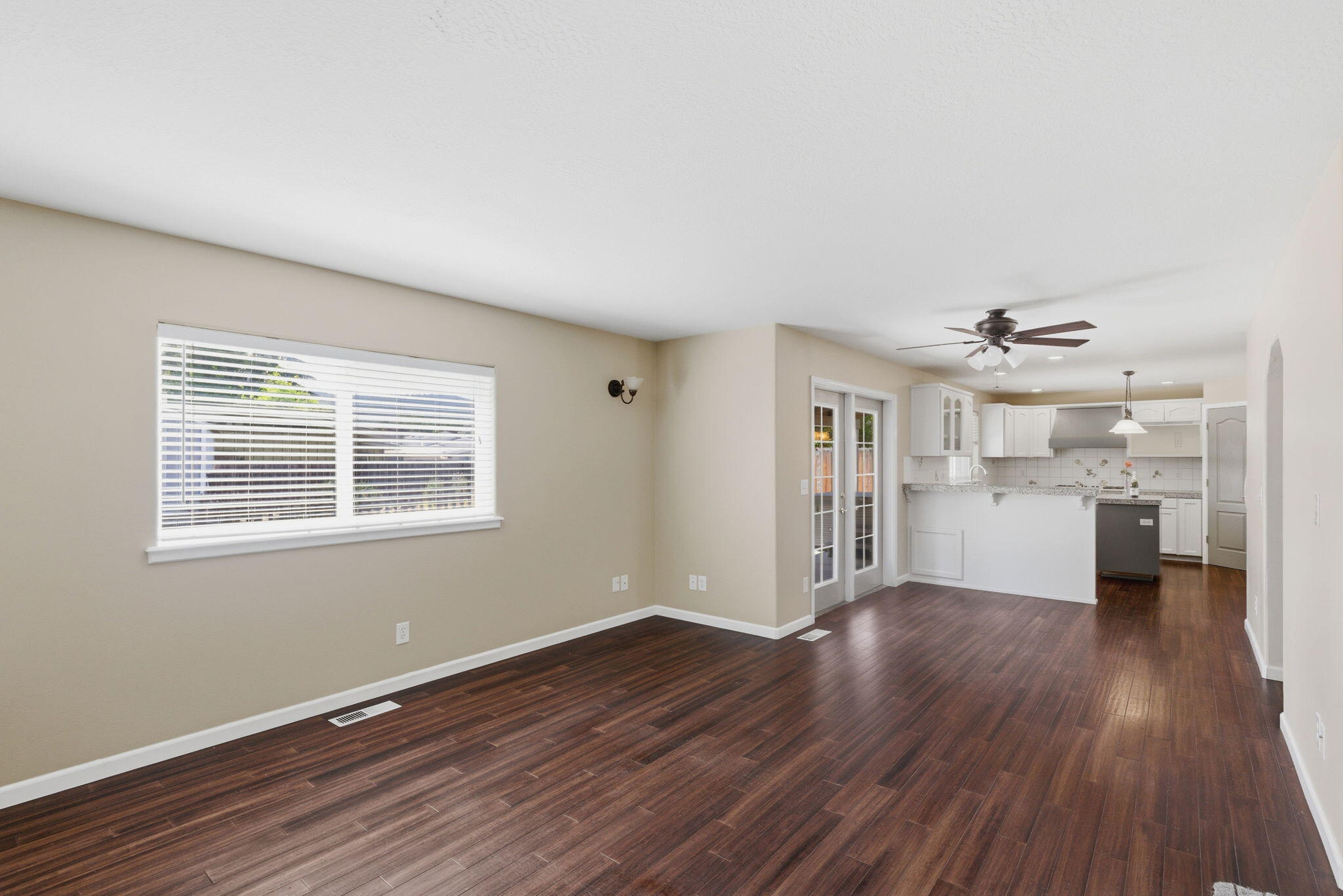 196 Nadine Lane Central Point, OR 97502 - Photo 19 of 54 a view of a kitchen with wooden floor and a window