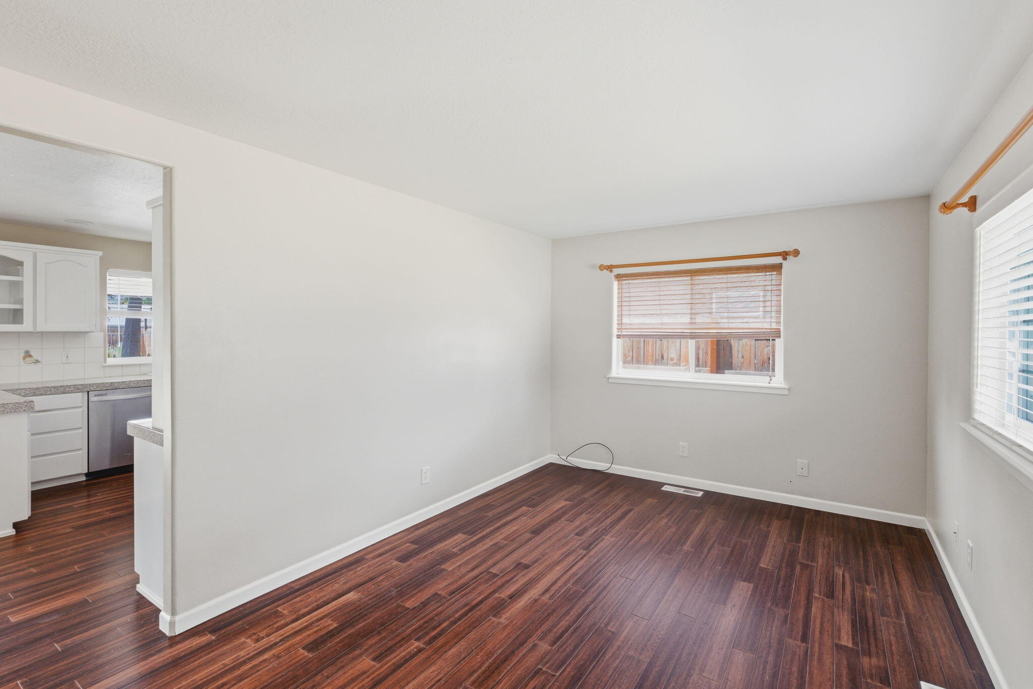 196 Nadine Lane Central Point, OR 97502 - Photo 2 of 54 a view of a room with wooden floor and a window