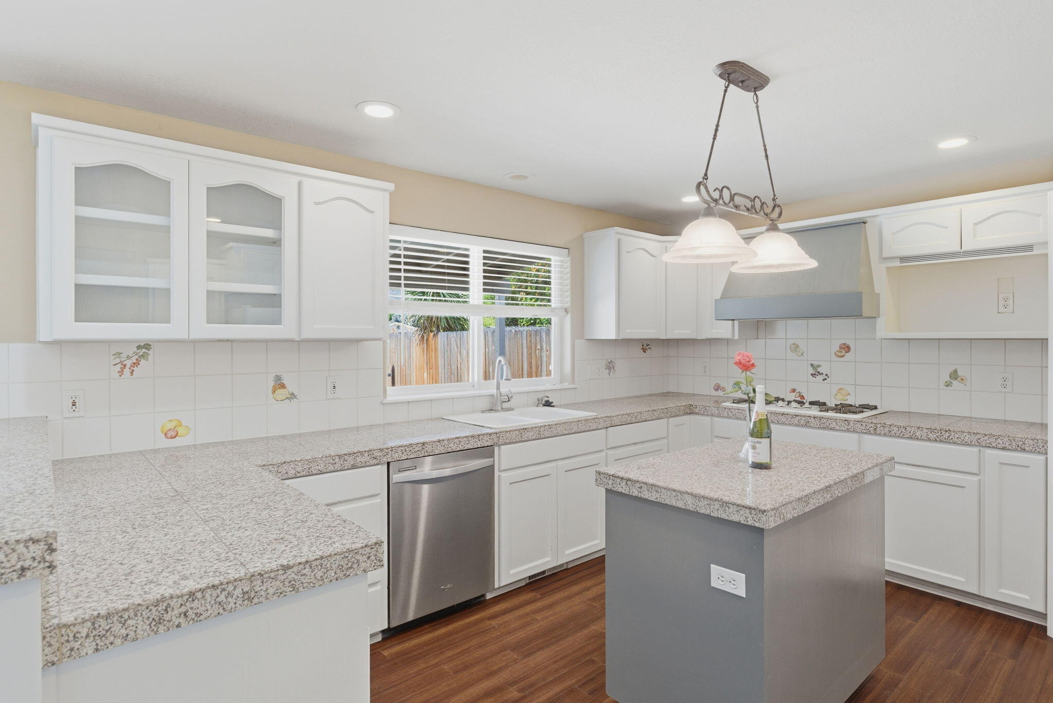196 Nadine Lane Central Point, OR 97502 - Photo 3 of 54 a kitchen with a sink a counter space appliances and cabinets