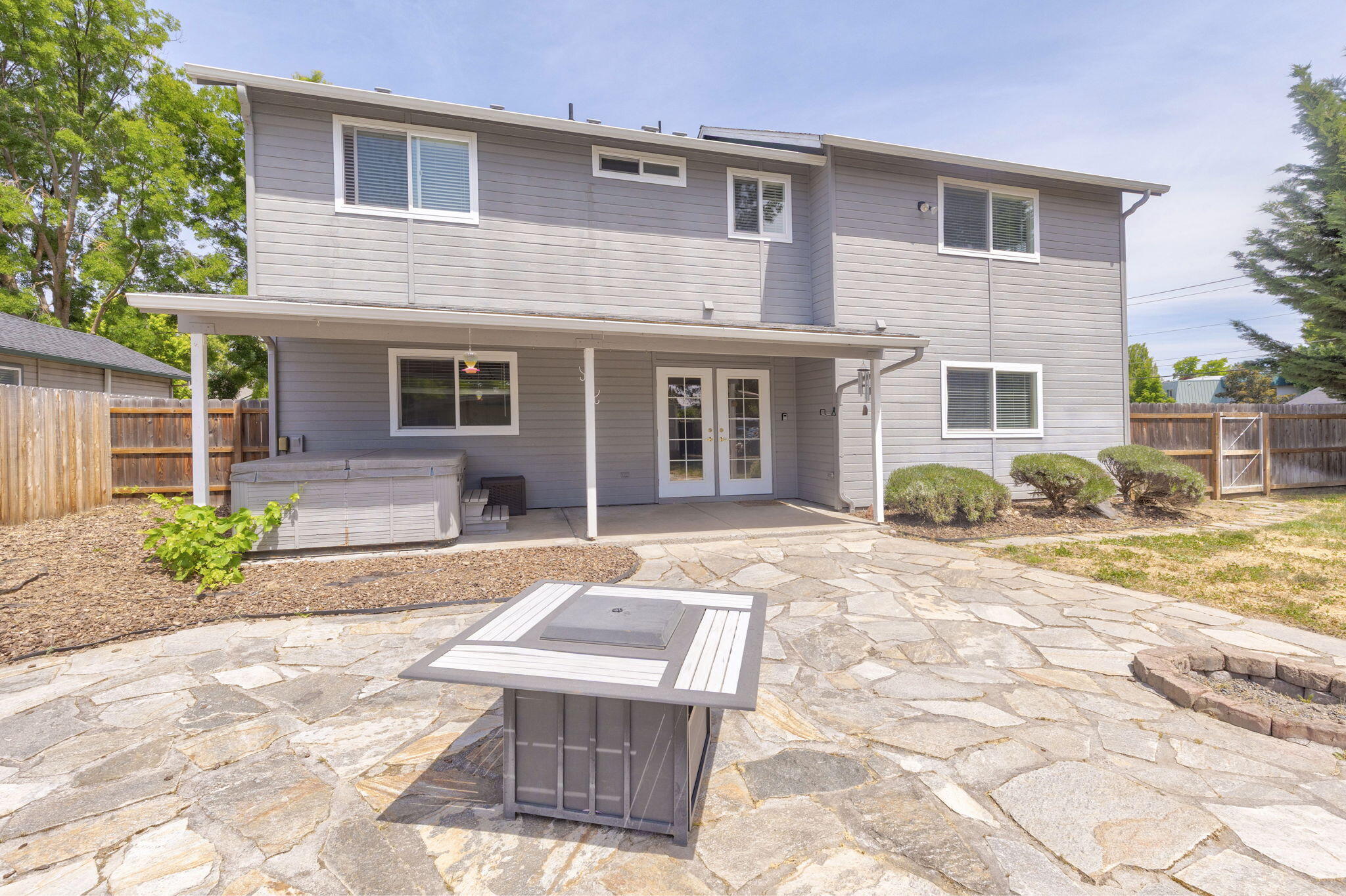 196 Nadine Lane Central Point, OR 97502 - Photo 44 of 54 a front view of a house with garden