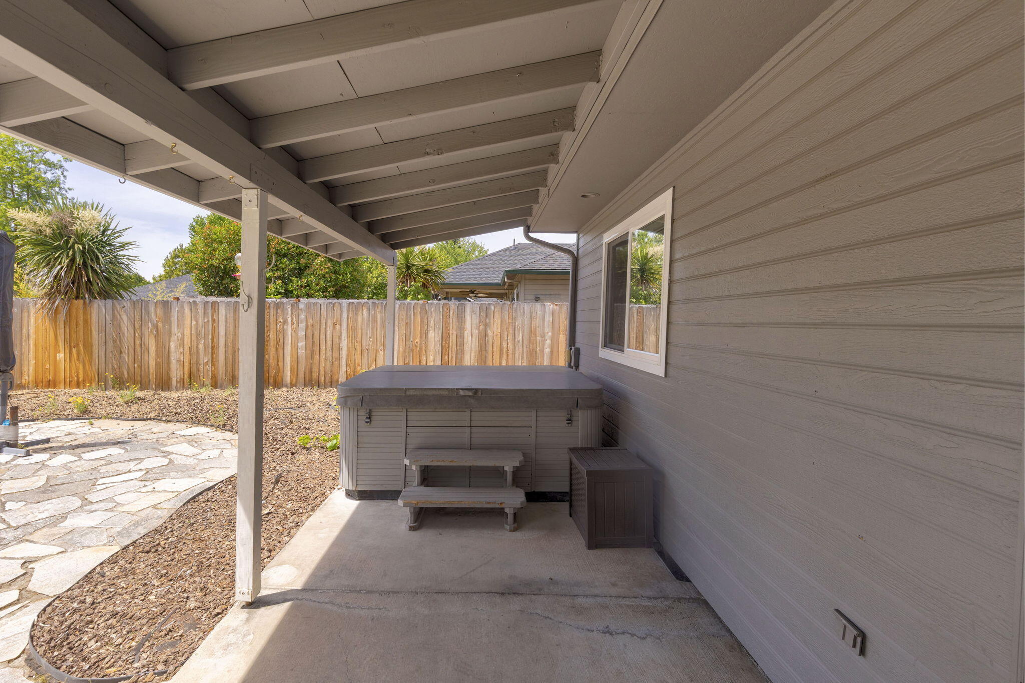 196 Nadine Lane Central Point, OR 97502 - Photo 45 of 54 a view of backyard with a sink and wooden fence