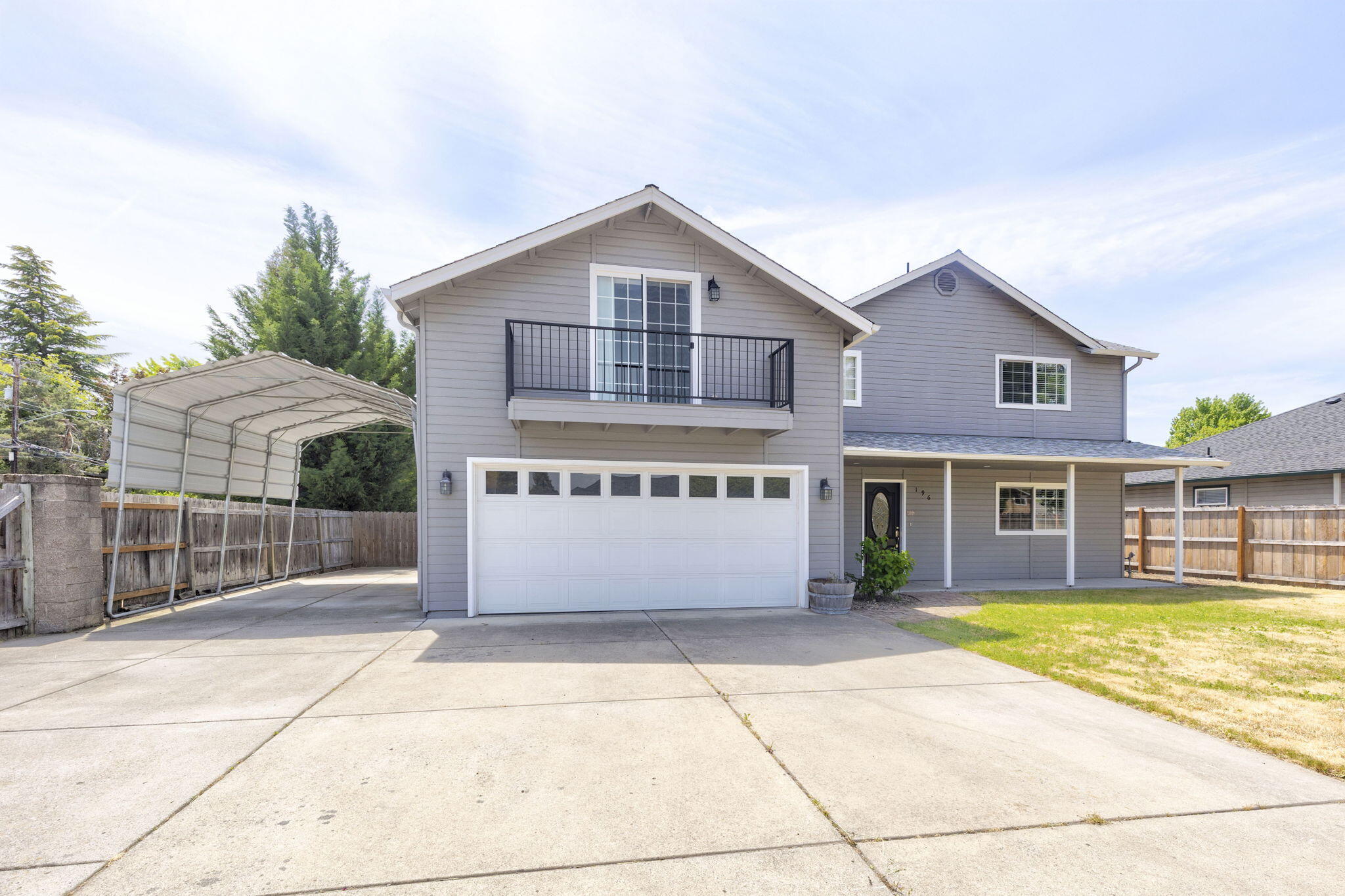 196 Nadine Lane Central Point, OR 97502 - Photo 52 of 54 a front view of a house with a outdoor space