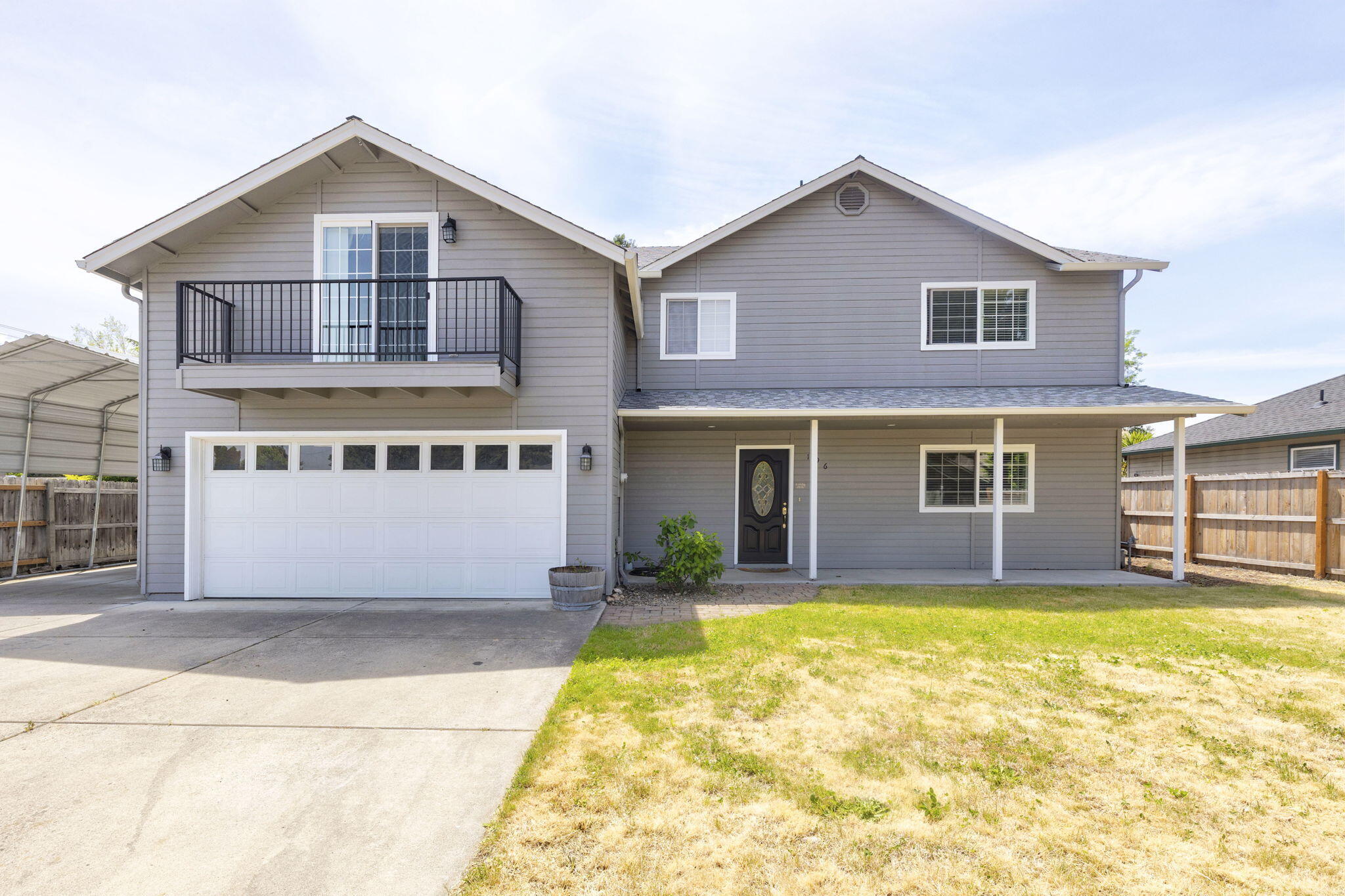 196 Nadine Lane Central Point, OR 97502 - Photo 54 of 54 a view of a house with a yard and a large tree