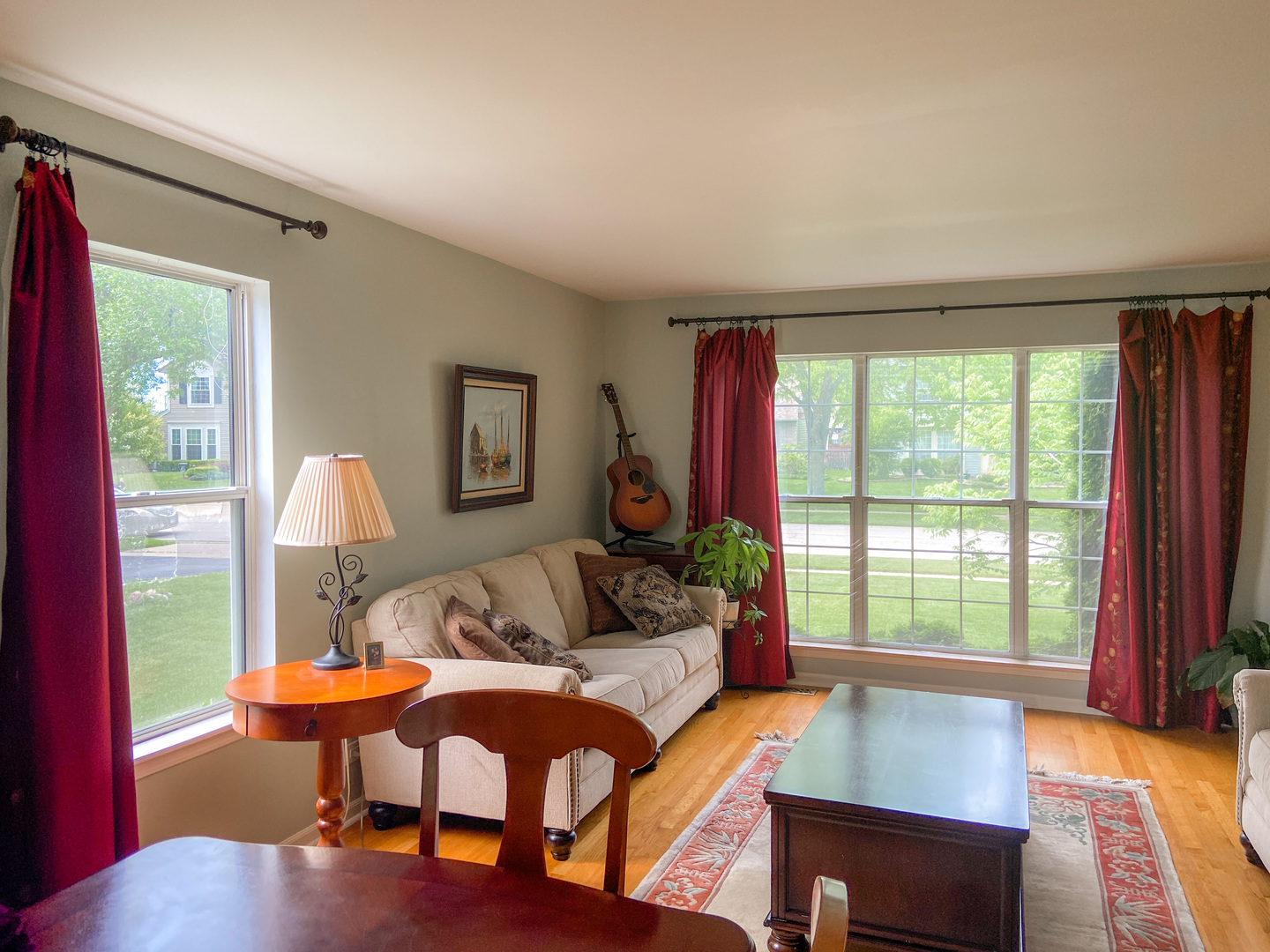 233 Dickens Trail Elgin, IL 60120 - Photo 8 of 18 a living room with furniture and a large window