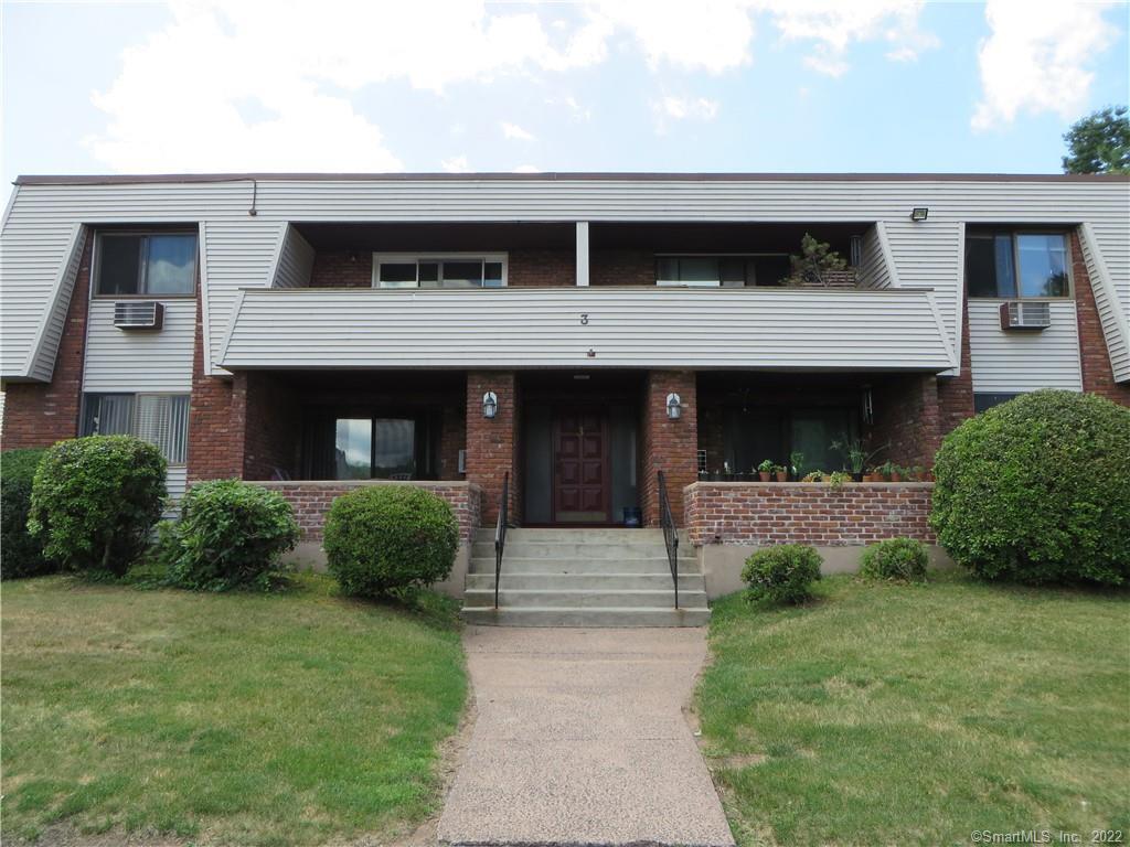 565 Talcottville Road, Unit 3A1 Vernon, CT 06066 - Photo 1 of 1 a front view of a house with a garden