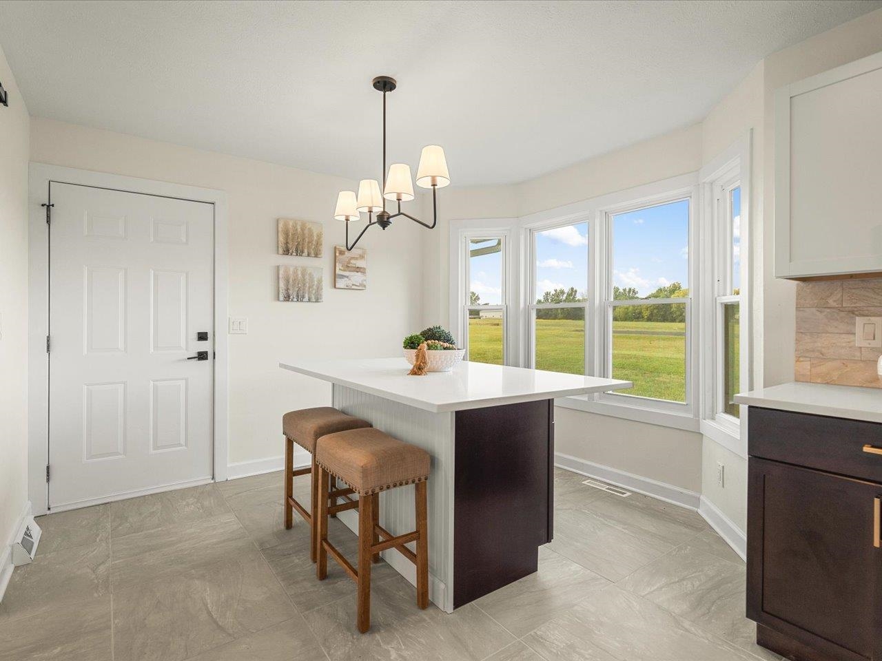 9281 Auburn Road Winnebago, IL 61088 - Photo 25 of 64 a view of a dining room with furniture window and outside view