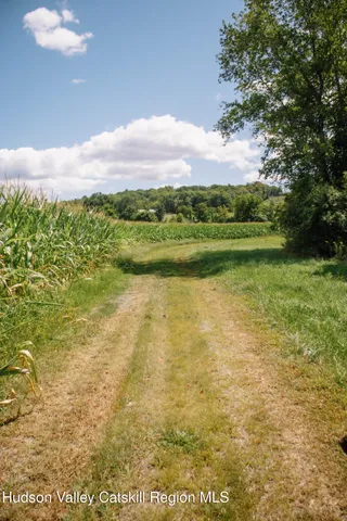a picture of a bathroom with a sink and mirror